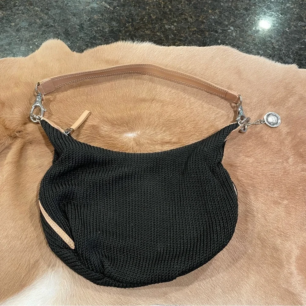 The sak pink label bag Black with Brown trim